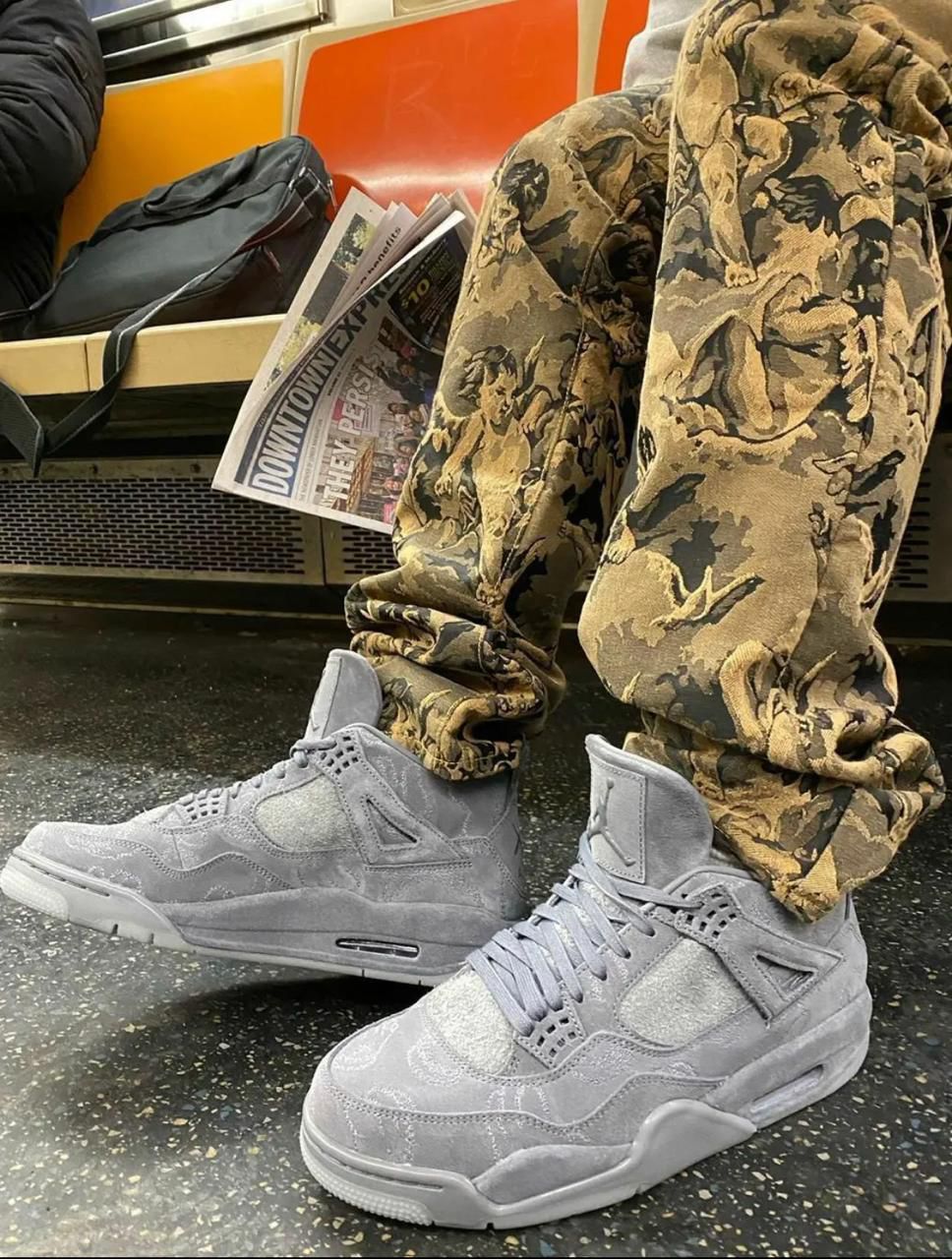 KAWS × Air Jordan 4 Retro 'Cool Grey'