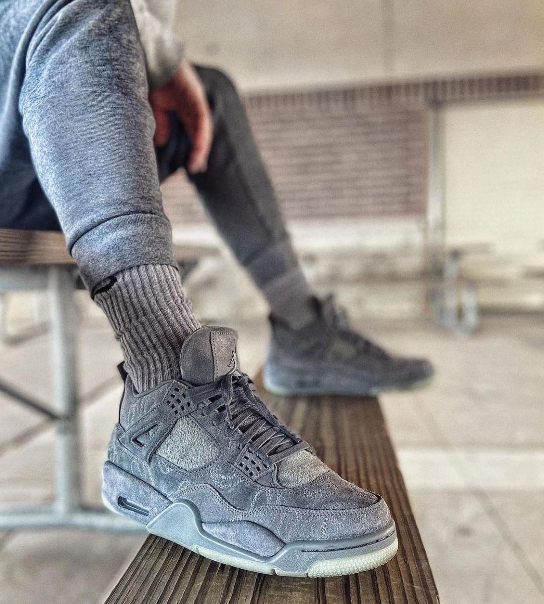 KAWS × Air Jordan 4 Retro 'Cool Grey'